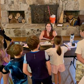 Kristen Muscaro-Winters with kids camp participants