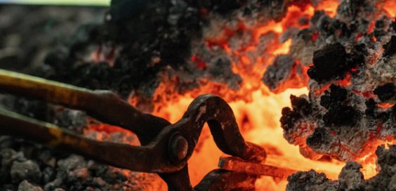 tongs in fire open studio